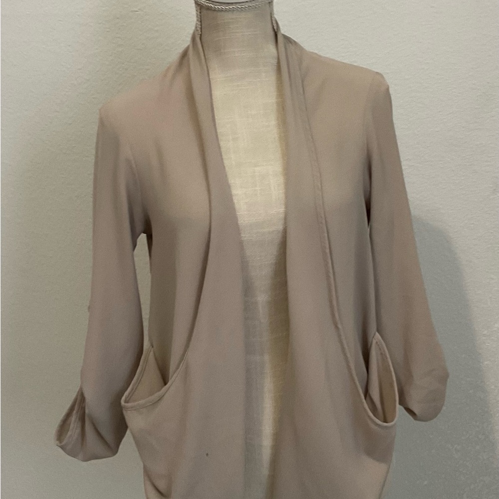 Have Taupe Ruched Cardigan.